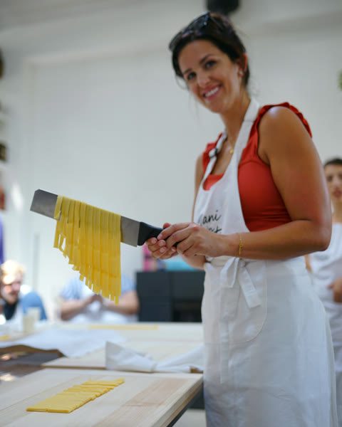 Holding up your first hand-cut tagliatelle