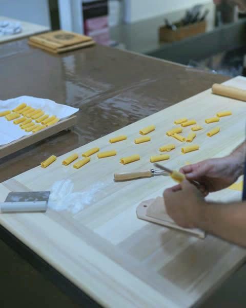Garganelli rolled on the wooden comb