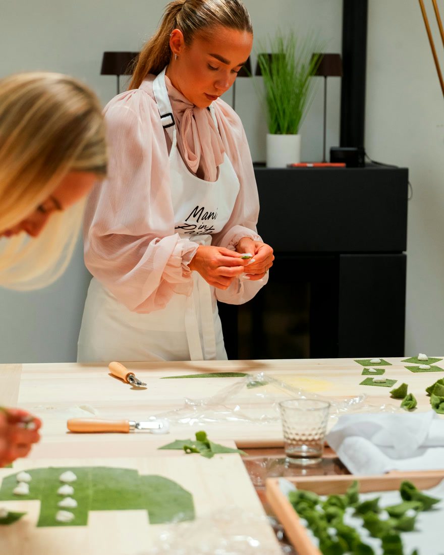 Sealing the ravioloni by hand
